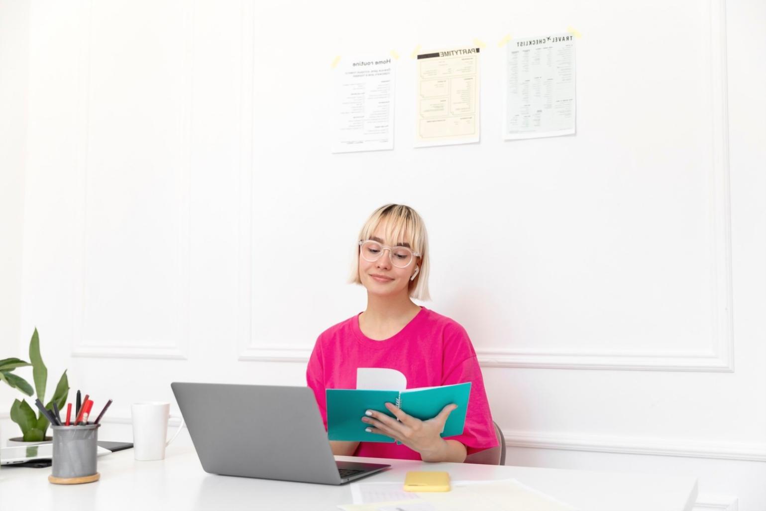 Hands working with financial documents and calculator on desk